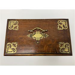 Brass mounted oak humidor, the slide action top opening to a base drawer, cedar lined with central compartment and striker, the drawer stamped Rd 107198, H17cm, D18cm