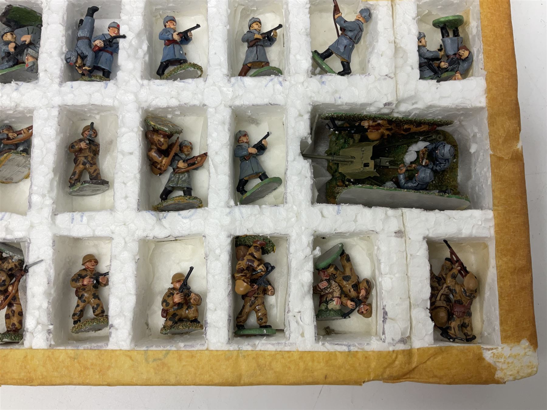 Lamming Miniatures - Bill Lammings own 1970s promotional display set of sixty-three 25mm miniature WW2 Russian Infantry soldiers with light artillery gun; hand painted by Bill Lamming for exhibition.