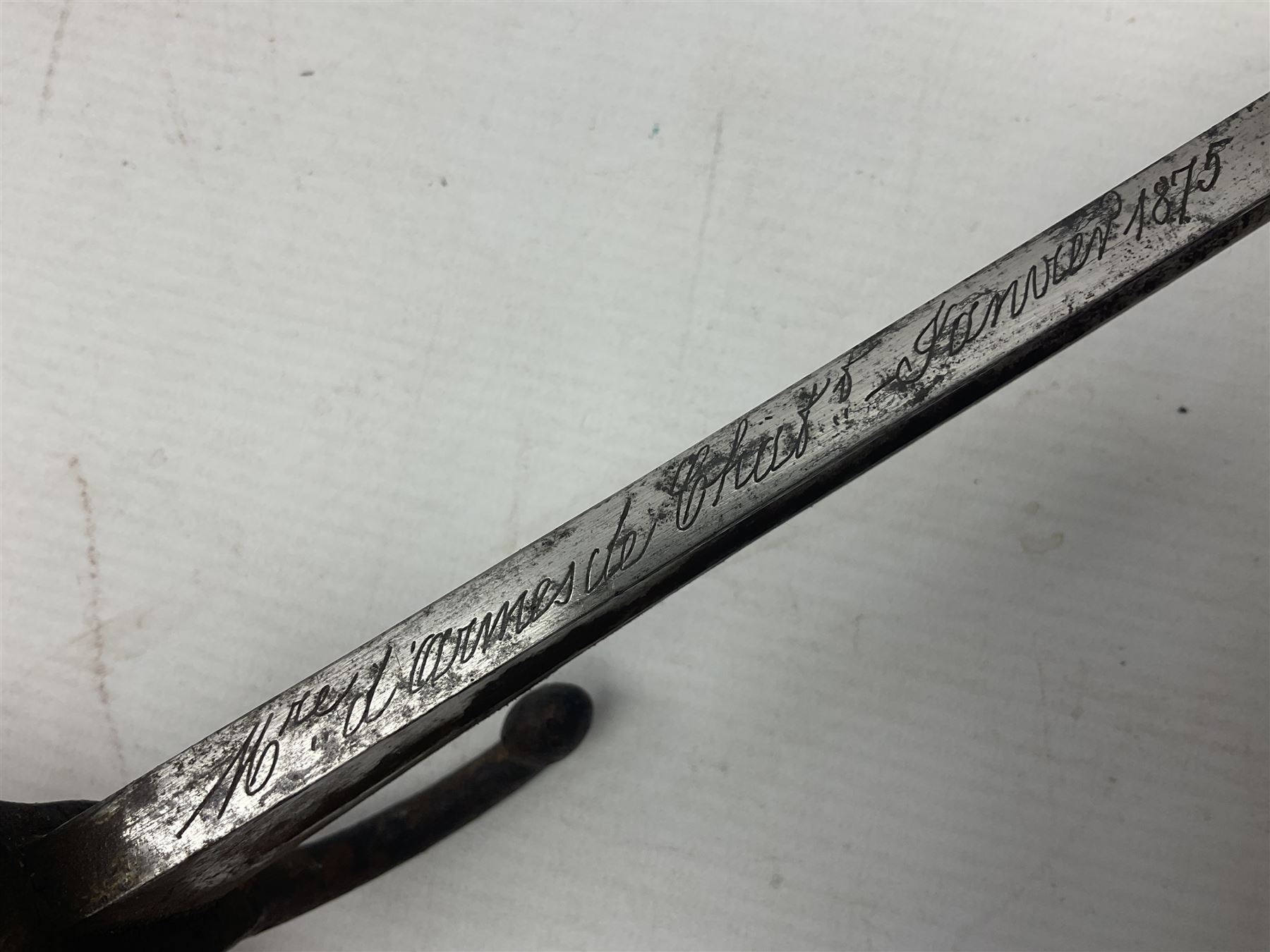 French 1866 pattern sabre bayonet with 57cm fullered steel curving blade dated 1875, in steel scabbard L71cm overall