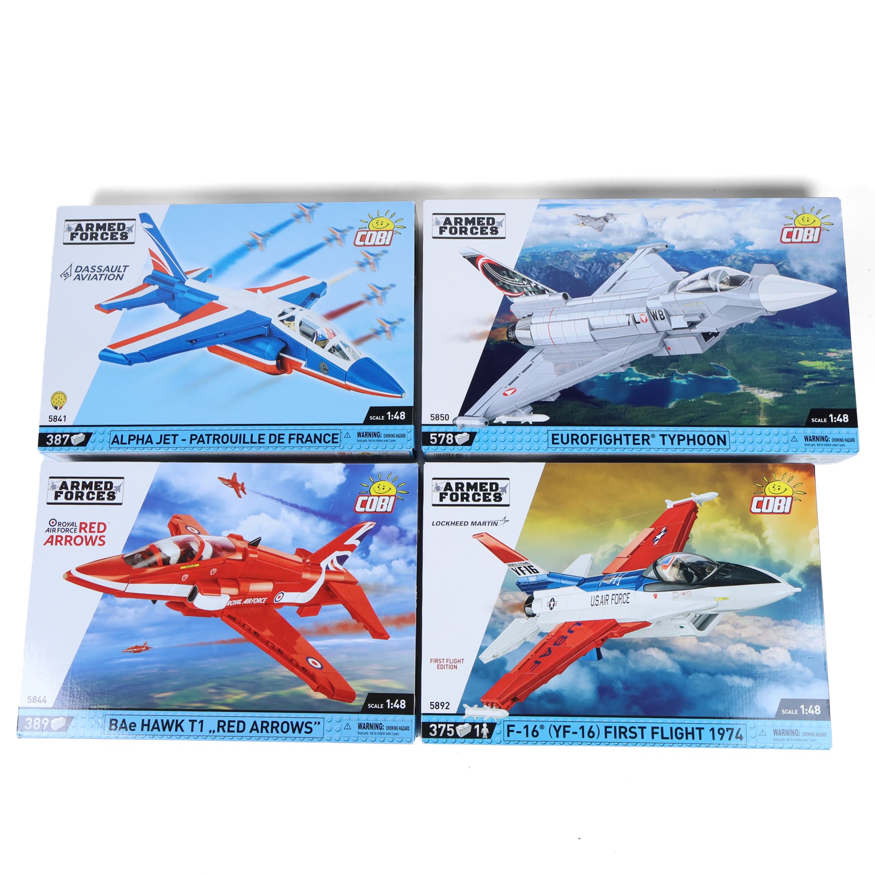 Four Cobi Bricks 1:48 scale Armed Forces model aircraft sets, comprising no. 5850 Eurofighter Typhoon, no. 5892 F-16 YF-16 First Flight 1974, no. 5841 Alpha Jet Patrouille De France and no. 5844 BAe Hawk T1 'Red Arrows', all in sealed boxes