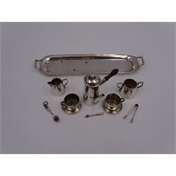 Edwardian miniature silver tea set, comprising hot chocolate pot, two cups and saucers, milk jug, sugar bowl and tray, hallmarked Cornelius Desormeaux Saunders & James Francis Hollings (Frank) Shepherd, Chester & Birmingham 1908, with two spoons and pair sugar tongs, hot water pot H3.8cm