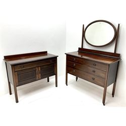 Early 20th century inlaid mahogany dressing chest, raised oval mirror back, two short and two long drawers (W107cm, H150cm, D47cm) and a matching washstand, single drawer, two cupboards (W99cm, H81cm, D44cm)
