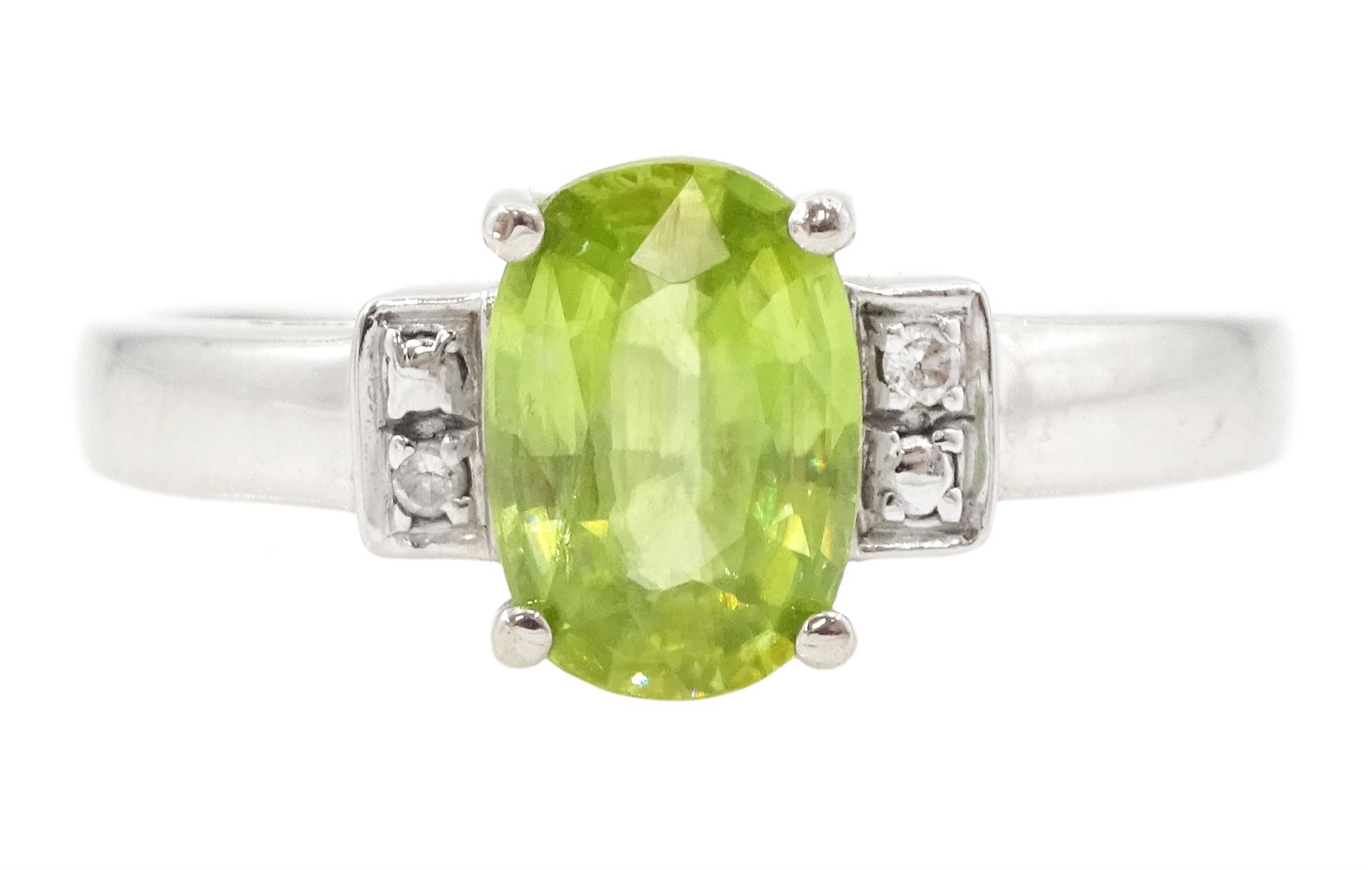 9ct white gold three stone oval cut peridot and diamond ring, hallmarked