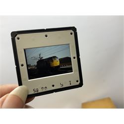Railwayana: Large collection of 35mm photographic slides, negative photographs, and photographs, mainly of Diesel trains, dating from the 1960s and 70s, together with a projector, and a quantity of other photographs and paper ephemera 
