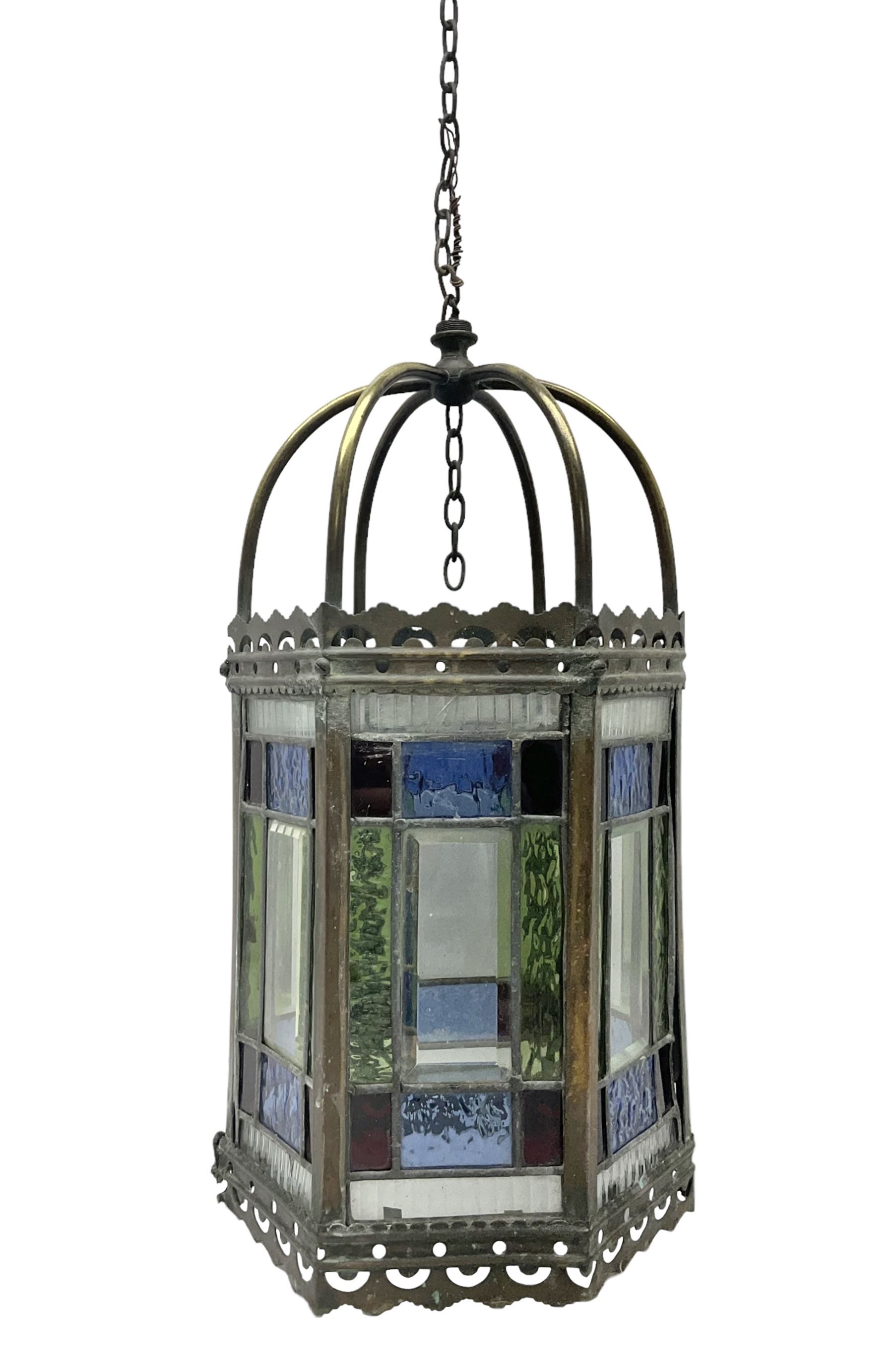 Victorian brass and stained leaded glass hall lantern, of hexagonal form, supported by four domed arms and pierced fret, H46cm W20cm