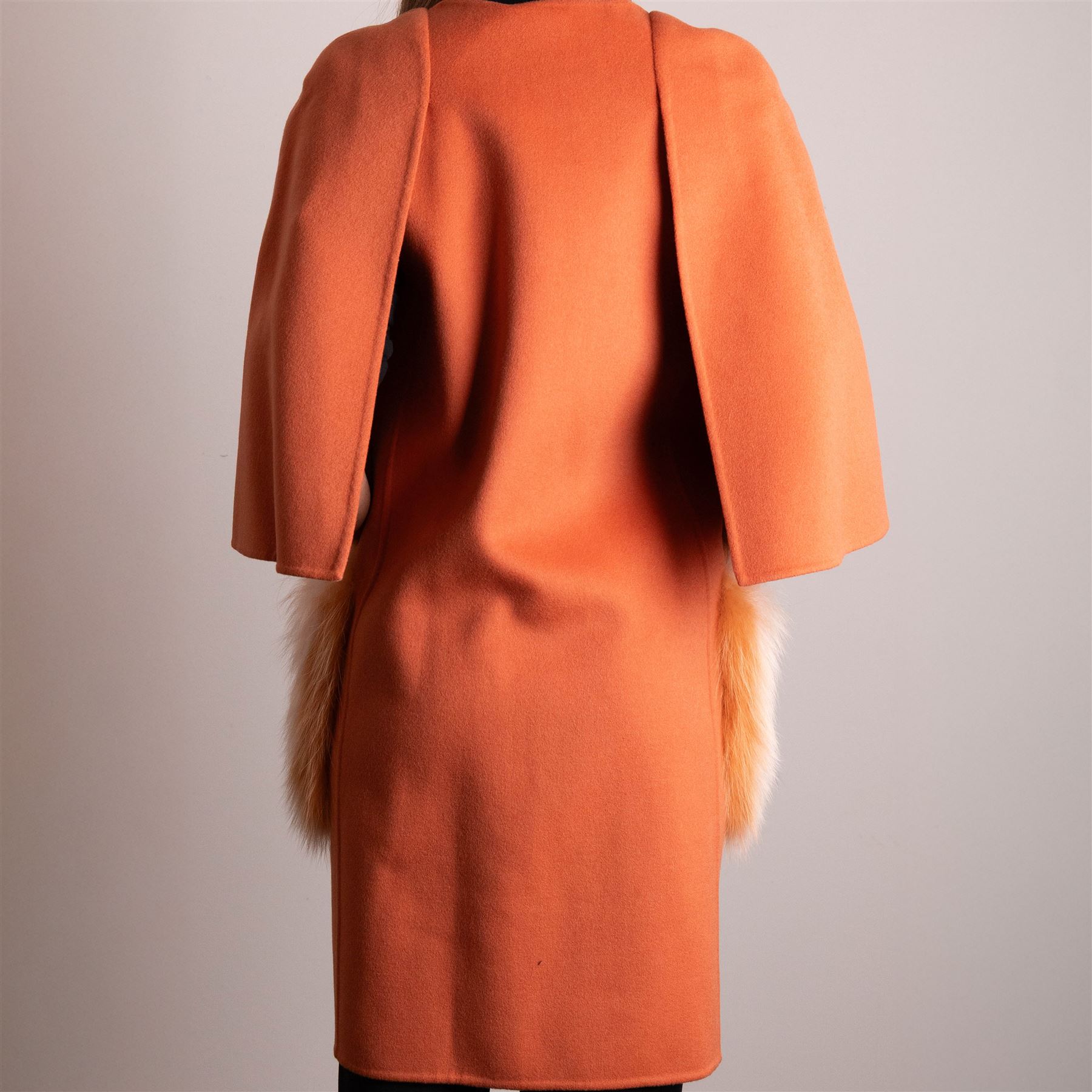 Fendi Roma - wool cape coat in 'Cayenne' orange peach, with concealed front fastening and short flared cape sleeves, applied with dyed arctic fox fur patch pockets, size 40, unused with original tags