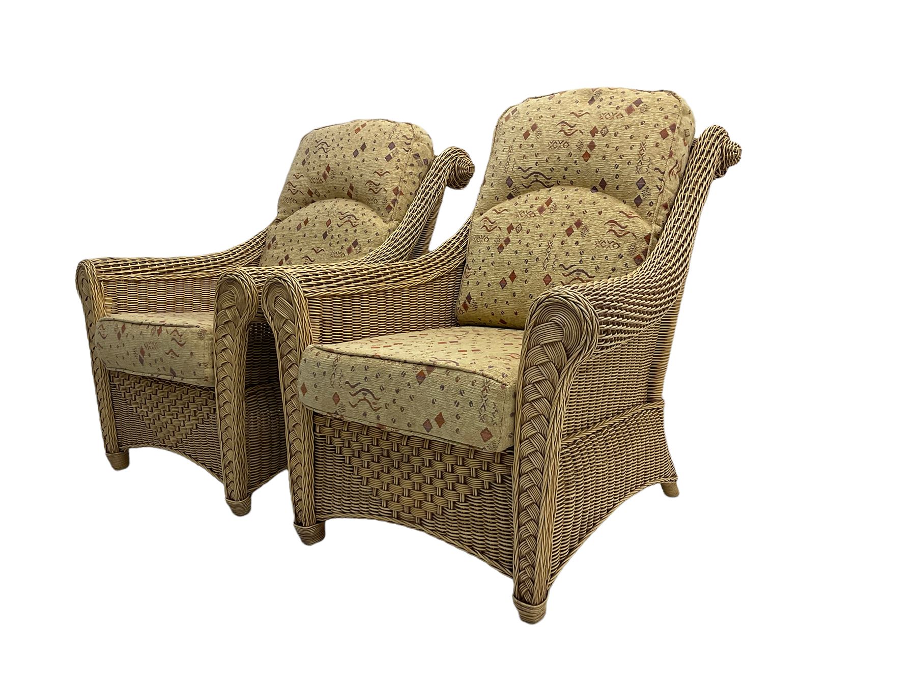 Four piece cane conservatory suite - two seat sofa (W130cm), pair of armchairs (W85cm), and coffee table (85cm x 60cm)