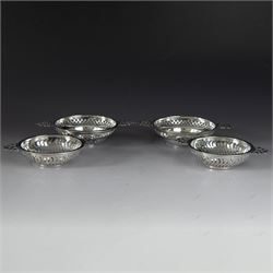 Two pairs of Victorian silver bon bon dishes, modelled as quaiches with pierced sides and ...