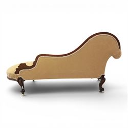 Victorian mahogany chaise lounge, scrolled back rest with deep buttoned back, upholstered in beige velvet, raised on a carved frame raised on cabriole supports terminating in castors 