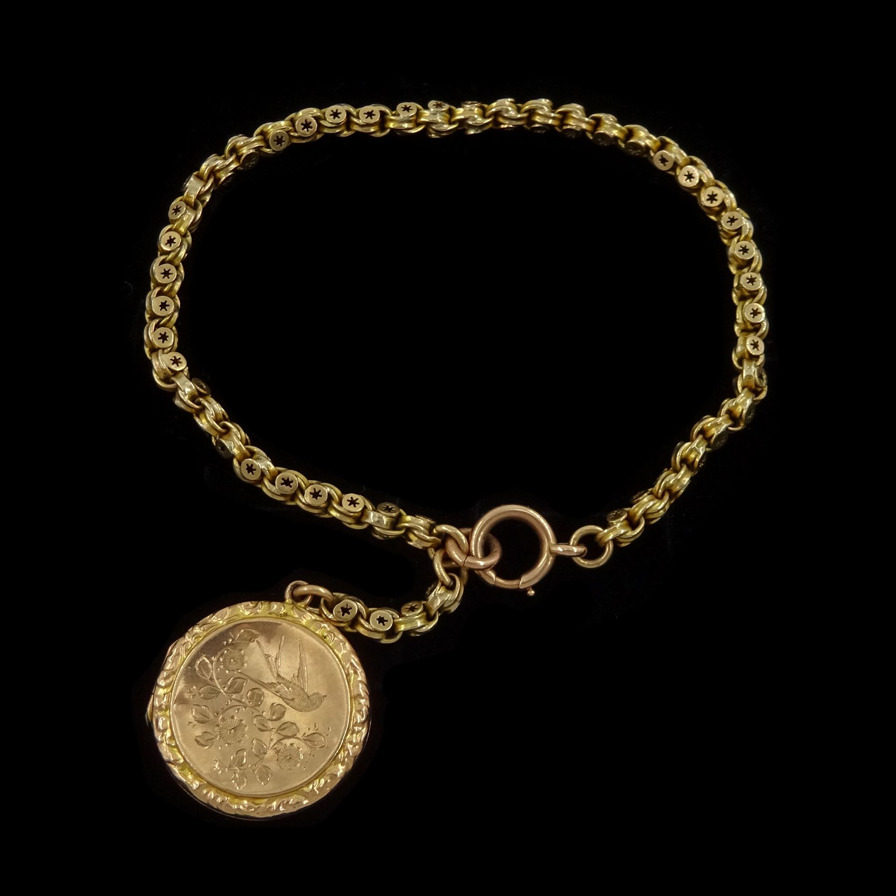 Early 20th century 10ct gold fancy link chain bracelet, with 9ct rose gold locket charm, with engraved bird decoration, Birmingham 1910