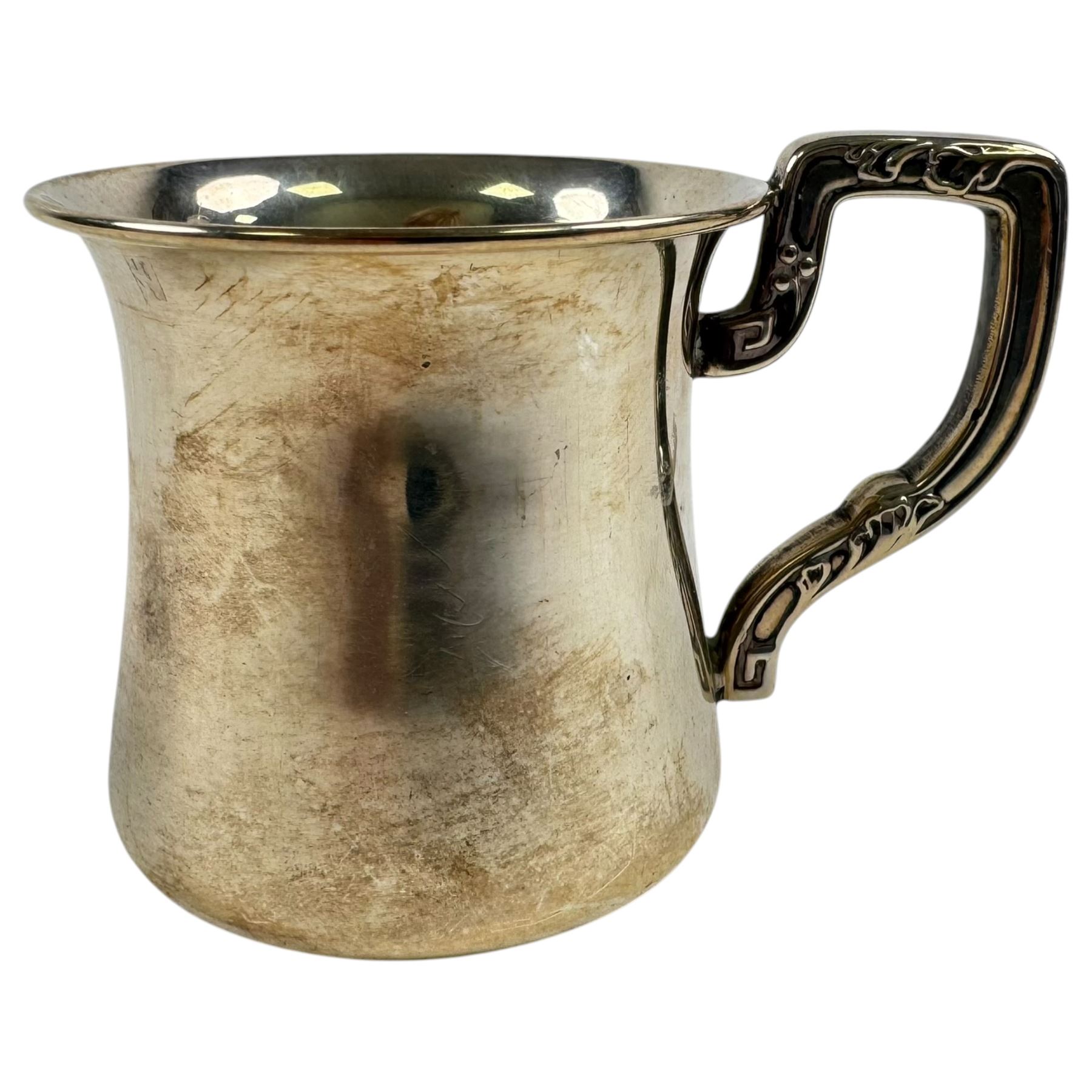Silver sauce boat, hallmarked and a small silver christening mug, stamped sterling