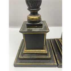 Pair of early 20th century wooden Corinthian column table lamp bases, with moulded scroll and foliate decoration, painted black with gilt detailing, upon stepped square base, one example with electric wiring, H88cm