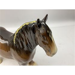 Three Beswick models comprising Hereford Bull no 949, 'CH Cutmil Cupie' Pug, and bay Shire horse, all with printed marks beneath