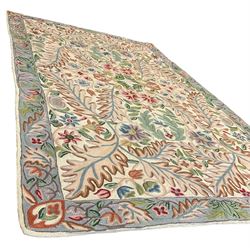 Crewel work wool chain wall hanging or rug, decorated with leaves and flower heads, the border with trailing floral pattern