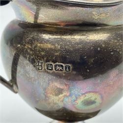 Edwardian silver helmet shaped milk jug, hallmarked