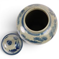 Pair of Chinese blue and white jars and covers, of baluster form, painted with fish and foliage H36cm