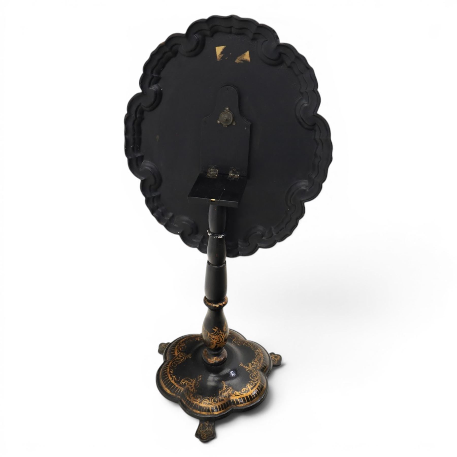 Victorian papier mache table, tilt top with painted decoration and mother of pearl inlay, raised on a baluster column shaped base terminating in pad feet