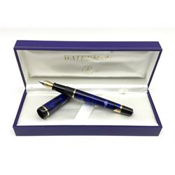 A Waterman Phileas fountain pen, with blue marbled effect body and gold coloured clip and banding, with makers fitted blue leather box, and outer card sleeve. 