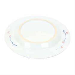 Early 18th century Chinese Imari armorial plate, circa 1720, painted with central arms of Fellowes quartering Coulson, surrounded by a European leaf scroll to the rim and heightened with gilt throughout, D22cm

Cf. Comparable pair of plates:
Lot 253, Benjamin F. Edwards III collection of Chinese Export, Christie's, 20th January 2004

Footnote: Sir John Fellowes was born in 1670, and was director and sub Governor of the South Sea Company. He became a baronet in 1719 and resided at Carshalton in Surrey. It is believed that this service would have been ordered in around 1719 or 1720

