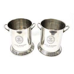 A pair of champagne buckets, of cylindrical form with twin handles, marked Lois Roederer, monogram and detailed Louis Roderer Fonde en 1776, H24 D18cm.
