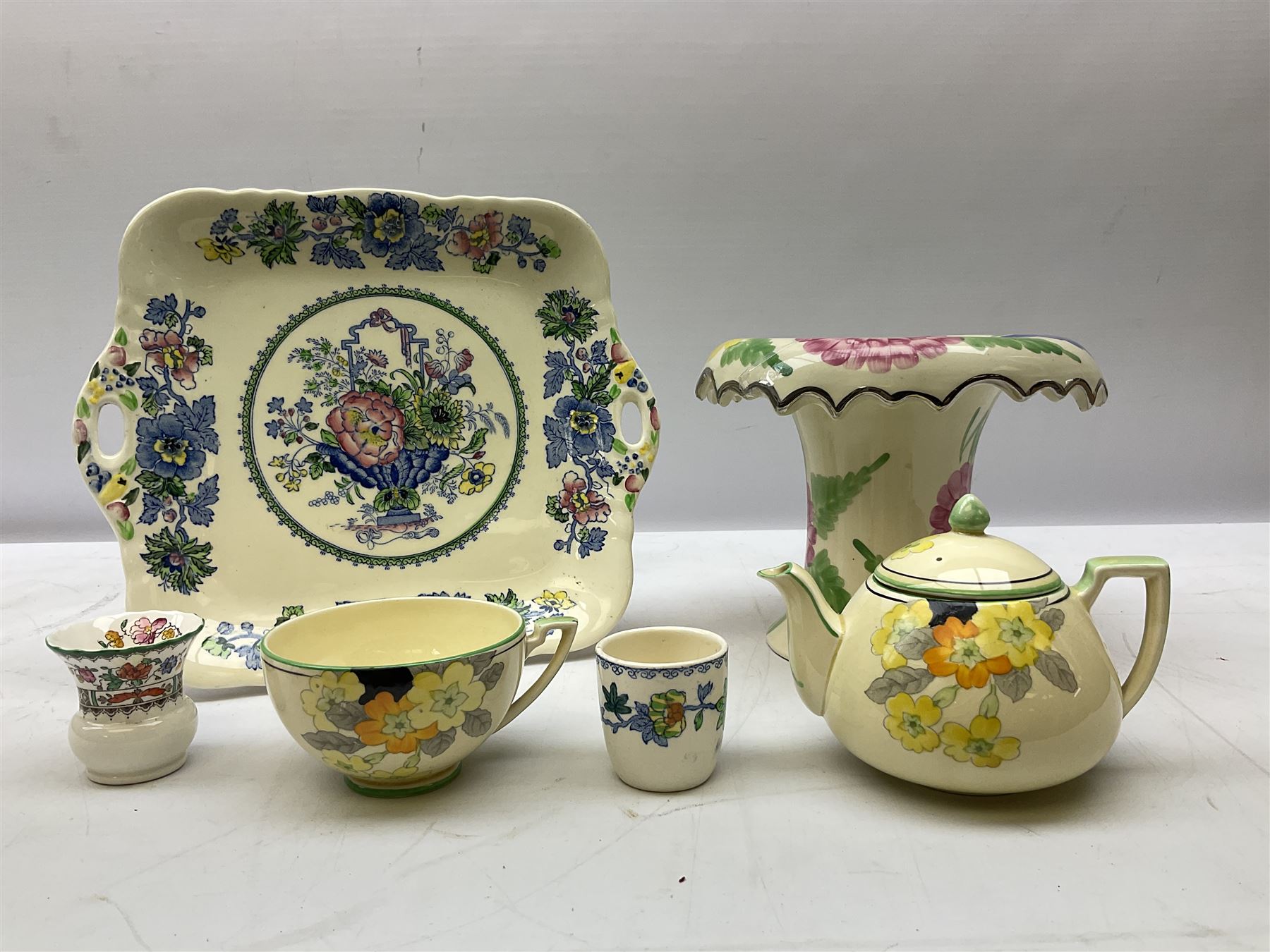 Group of ceramics to include Art Deco examples, Arthur Wood twin handled vase decorated in the Garden Wall pattern, Art Deco style Coalport twin handled lidded sucrier and saucer, Mason's Applique jug (scratch through mark), Royal Doulton Minden bowl and jug, Copeland Spode Royal Jasmine jug, Crown Devon, etc