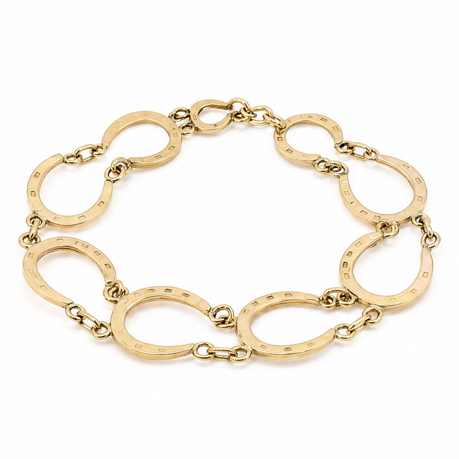 9ct gold horseshoe link bracelet, with toggle clasp, Birmingham 1975