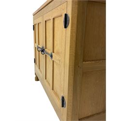 'Mouseman' oak display cabinet on cupboard, raised cabinet enclosed by two lead glazed doors, adzed oak top over double panelled cupboard, fitted with ironwork and carved with mouse signature, by Robert Thompson of Kilburn