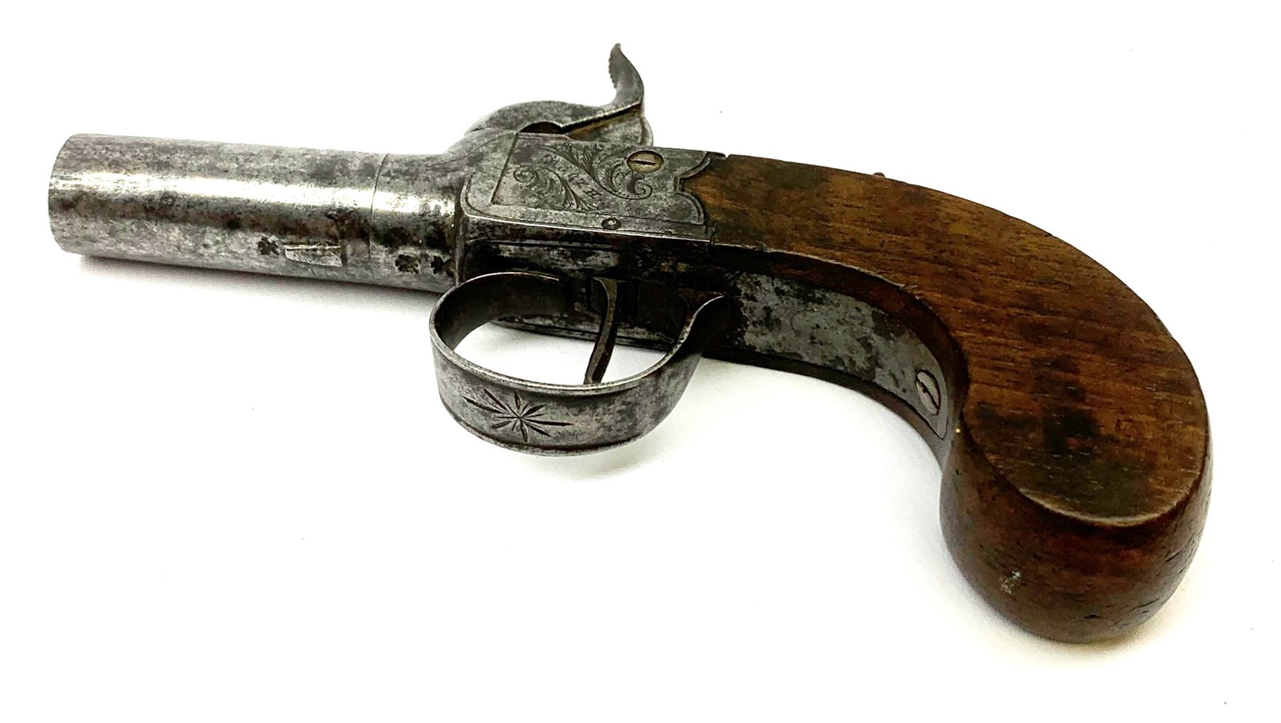 19th century English percussion box lock pocket pistol by Booth Huddersfield with (seized) turn-off barrel, engraved lock, walnut stock and thumb safety L16cm overall
