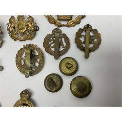 Over thirty WW1 and WW2 cap badges including Royal Marines, RASC, RAOC, Lancashire Fusiliers, York & Lancaster, RE, RA, East Yorkshire, Royal Berkshire, RAC, ATS, RAMC, West Yorkshire, Reconnaissance Corps etc; Services Rendered badge No.B143796; small quantity of shoulder titles, buttons etc