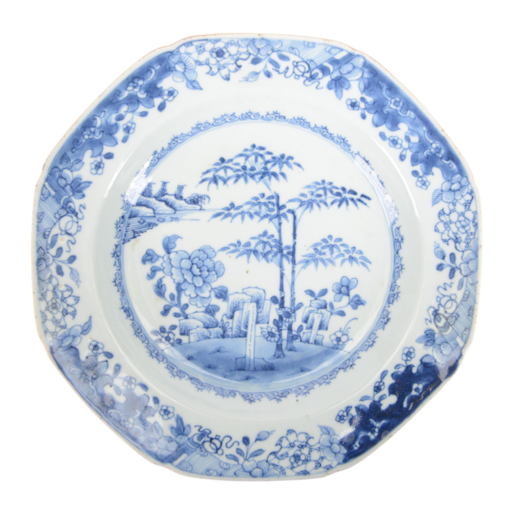 19th century Cantonese plate of octagonal form decorated to the centre with a garden of flowering peonies, together with two other 19th century plates and two serving platters each depicting temples in landscapes, octagonal plate W31cm  