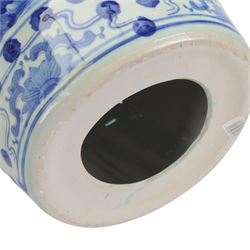 Pair of Chinese blue and white garden stools, decorated with pagodas a landscape, H40cm 