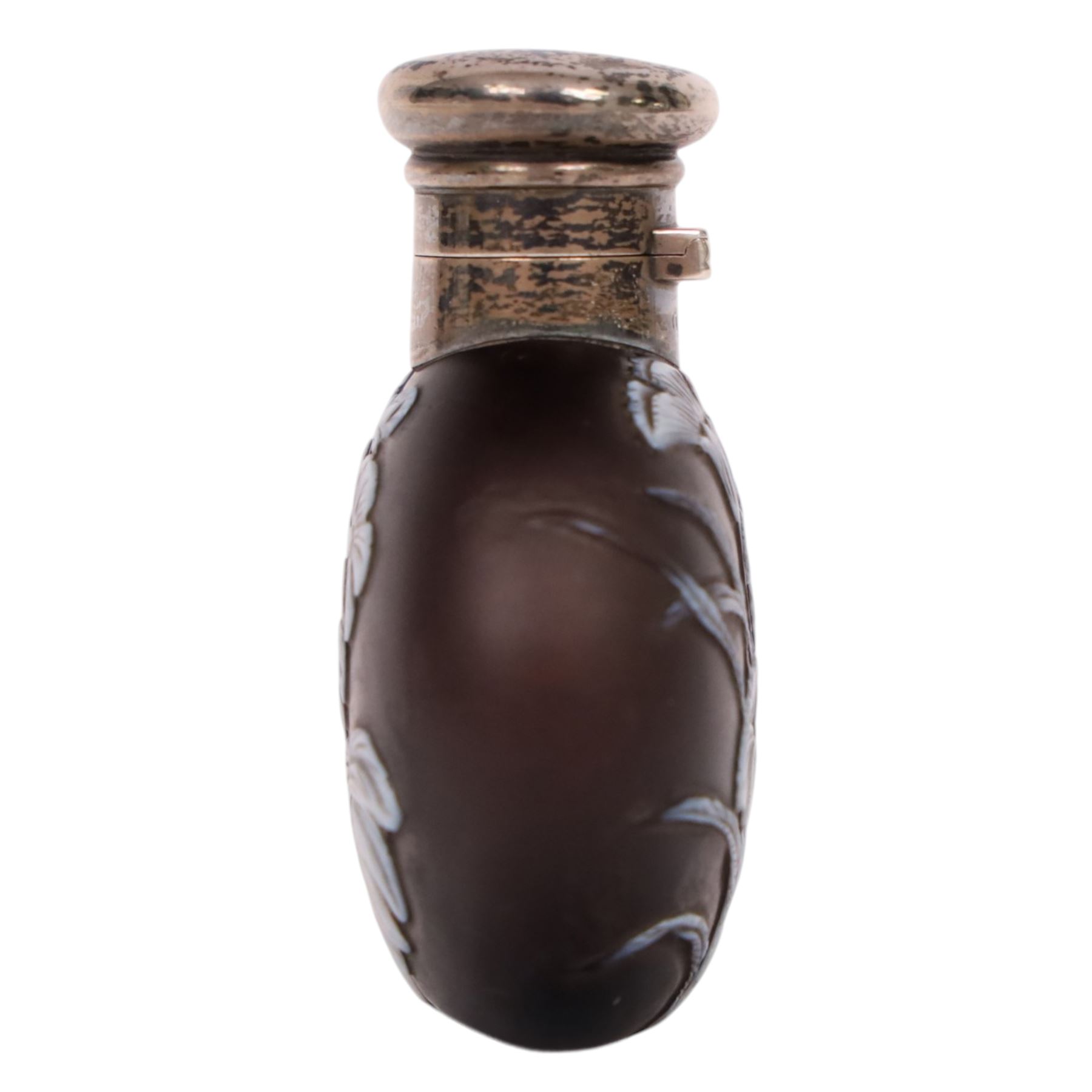 Victorian Thomas Webb silver mounted cameo glass scent bottle, hallmarked Sampson Mordan and Co, London 1884, the cameo glass body of circular form, decorated with white flowers and foliage in high relief upon a black ground, the hinged cover opening to reveal the original stopper, H6cm 