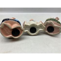 Set of five Wade NatWest money boxes, comprising father, mother, boy, girl and baby, four with original boxes 