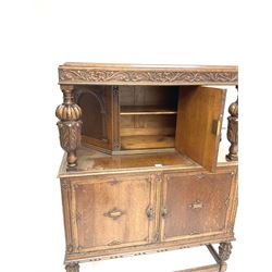 Early 20th century carved oak court cupboard fitted with single cupboard above double cupboard doors, melon fluted acanthus carved supports joined by perimeter stretcher