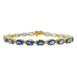 Gold oval cut London blue topaz link bracelet, stamped