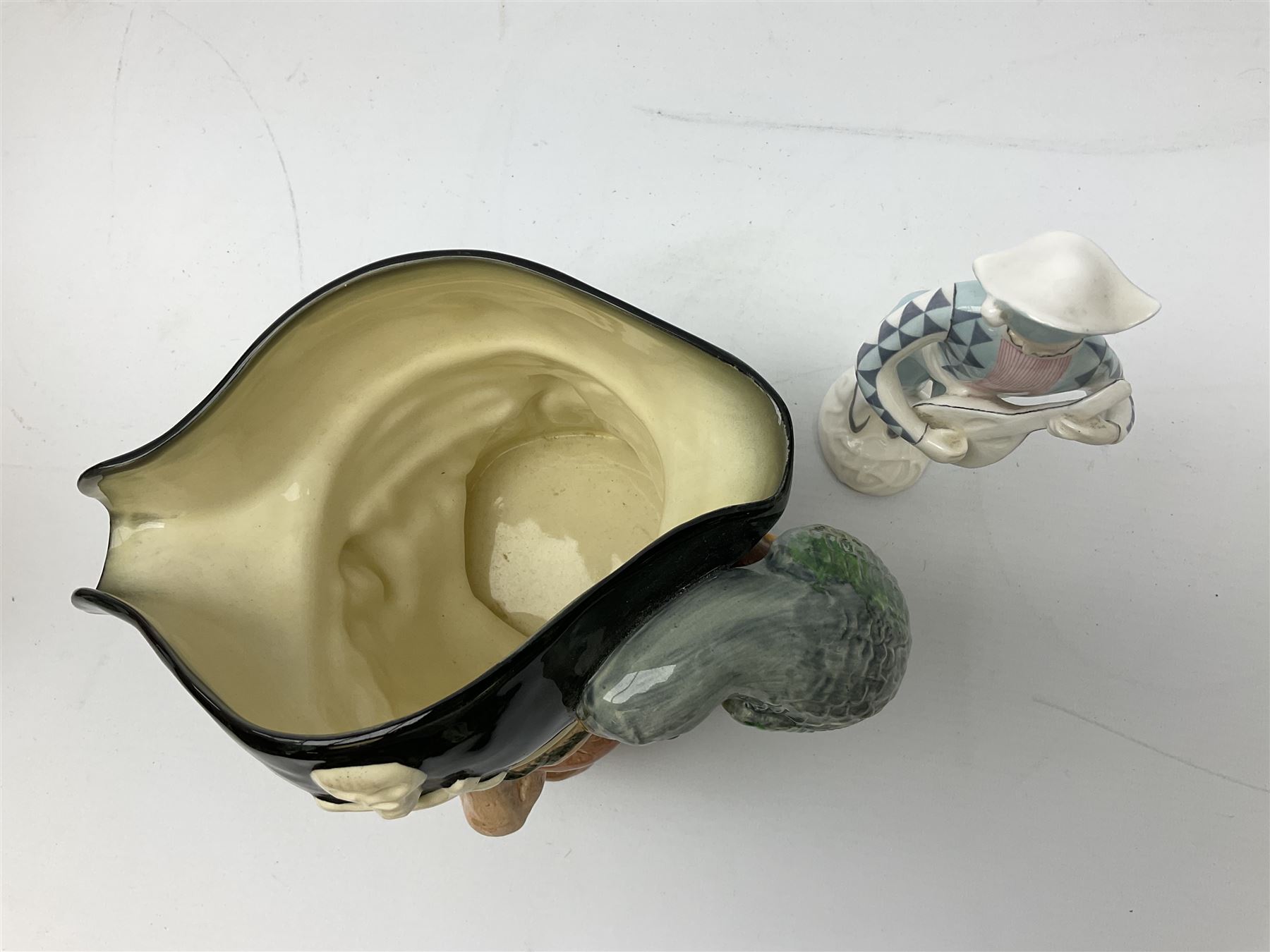 Royal Doulton figure Harlequin HN2186, together with Royal Doulton Long John Silver character jug D6335 and Francesca Art china figure bubbles