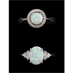 Two silver opal and cubic zirconia rings, both stamped 925