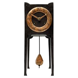 A German Arts and Crafts 'Gesamtkunstwerk' mantle clock c1890 in a square formed iron case with abalone incised triangles to each corner, case raised on four legs with inward facing feet,  convex copper chapter ring hand engraved with upright Arabic numerals, conforming copper hands in an individual style, with an eight-day spring driven rack striking movement manufactured by Lenzkirch, striking the hours and half hours on a bell, conforming steel pendulum with a hand-crafted faceted pear-shaped copper bob. With key.
Lenzkirch were one of the most prolific and respected German clock manufacturers of the 19th and early 20th century, it is highly probable that this movement was removed from another clock and incorporated into this artisan case when made at the end of the 19th century.