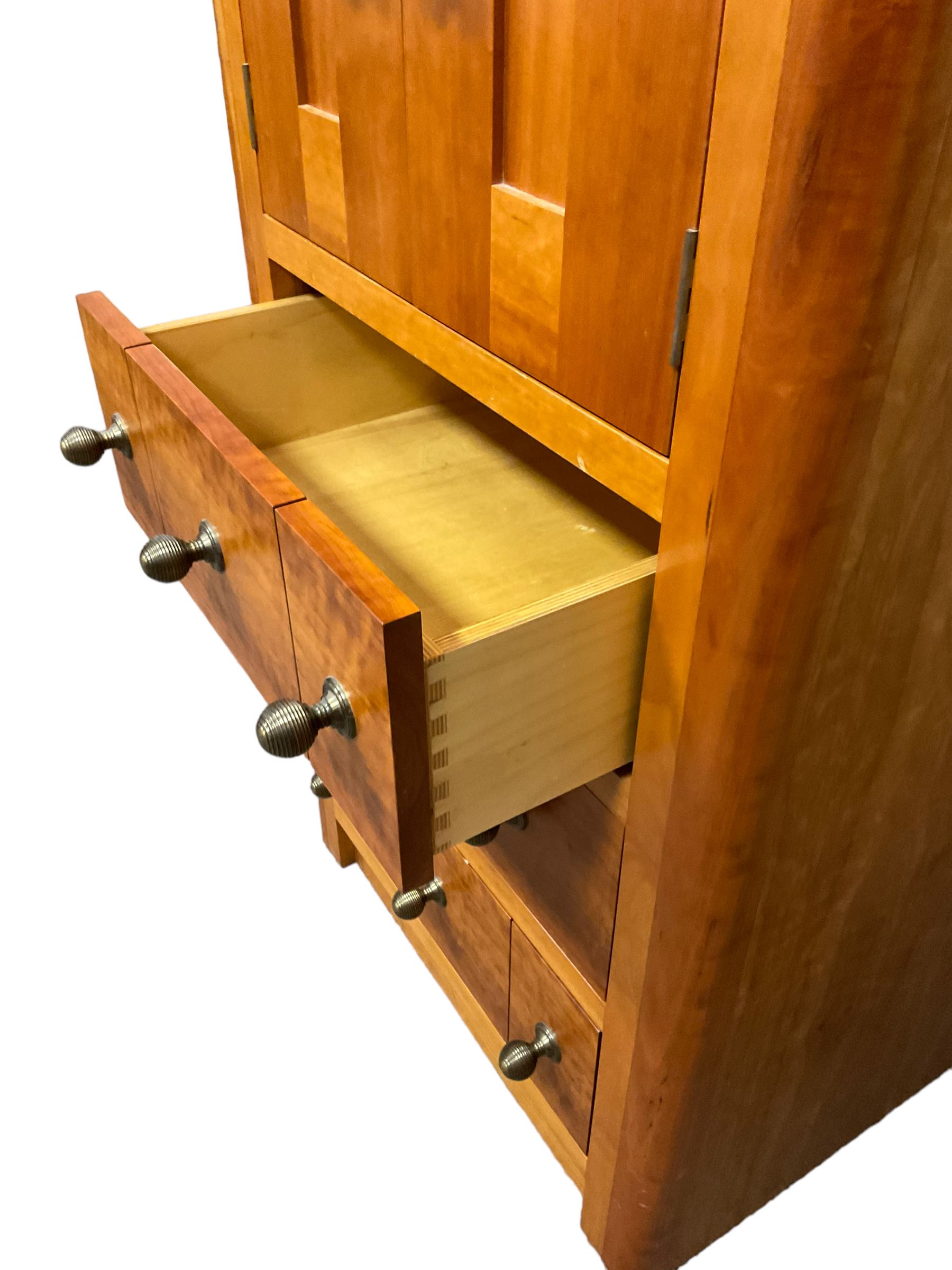 Cherry wood cabinet, fitted with double cupboard over two short and two long drawers, with faux drawer facias