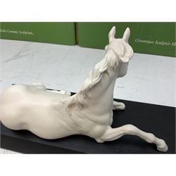 Five Beswick and Royal Doulton horse figures in matt white on black plinths, comprising of  Spirit of Affection no. 2689/2536, Springtime no.2837, Spirit of peace no.2916, Spirit of earth no.2914 and Spirit of the wild no. 183, together with a composite figure of a horse (6)