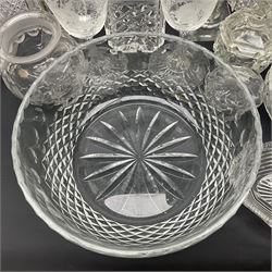 Collection of 18th century and later cut glass, including a pair of Victorian onion shaped decanters with elongated necks and hobnail cut decoration, together with a similar jug, of tapering form with C handle and an Georgian cut glass jug, with stepped decoration to neck and square cut decoration to body, tallest jug H30cm