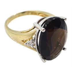 9ct gold oval smokey quartz ring, with diamond set shoulders, hallmarked