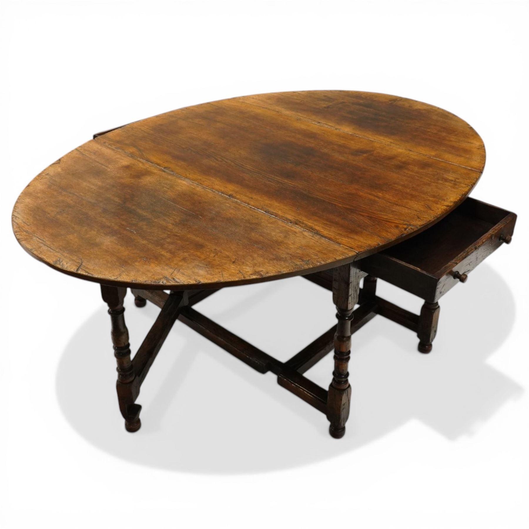 Titchmarsh & Goodwin - oak drop leaf table with double drawer, gateleg turned supports united by stretchers