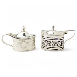 Silver three piece oval condiment set with engraved decoration Birmingham 1961, pierced silver mustard pot Chester 1901, silver pepperette and silver mounted glass salt