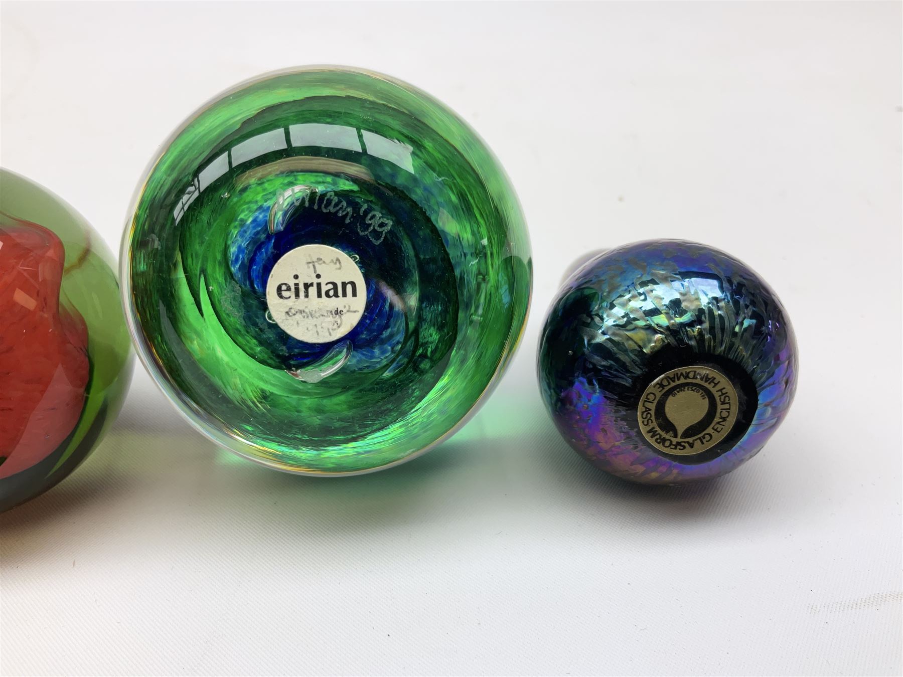 Collection of glass paperweights to include three Wedgwood examples modelled as birds, two Rosenthal faceted examples, a millefiori example, together with art glass examples to include Eirian swirled teardrop and another teardrop shaped paperweight by Caithness