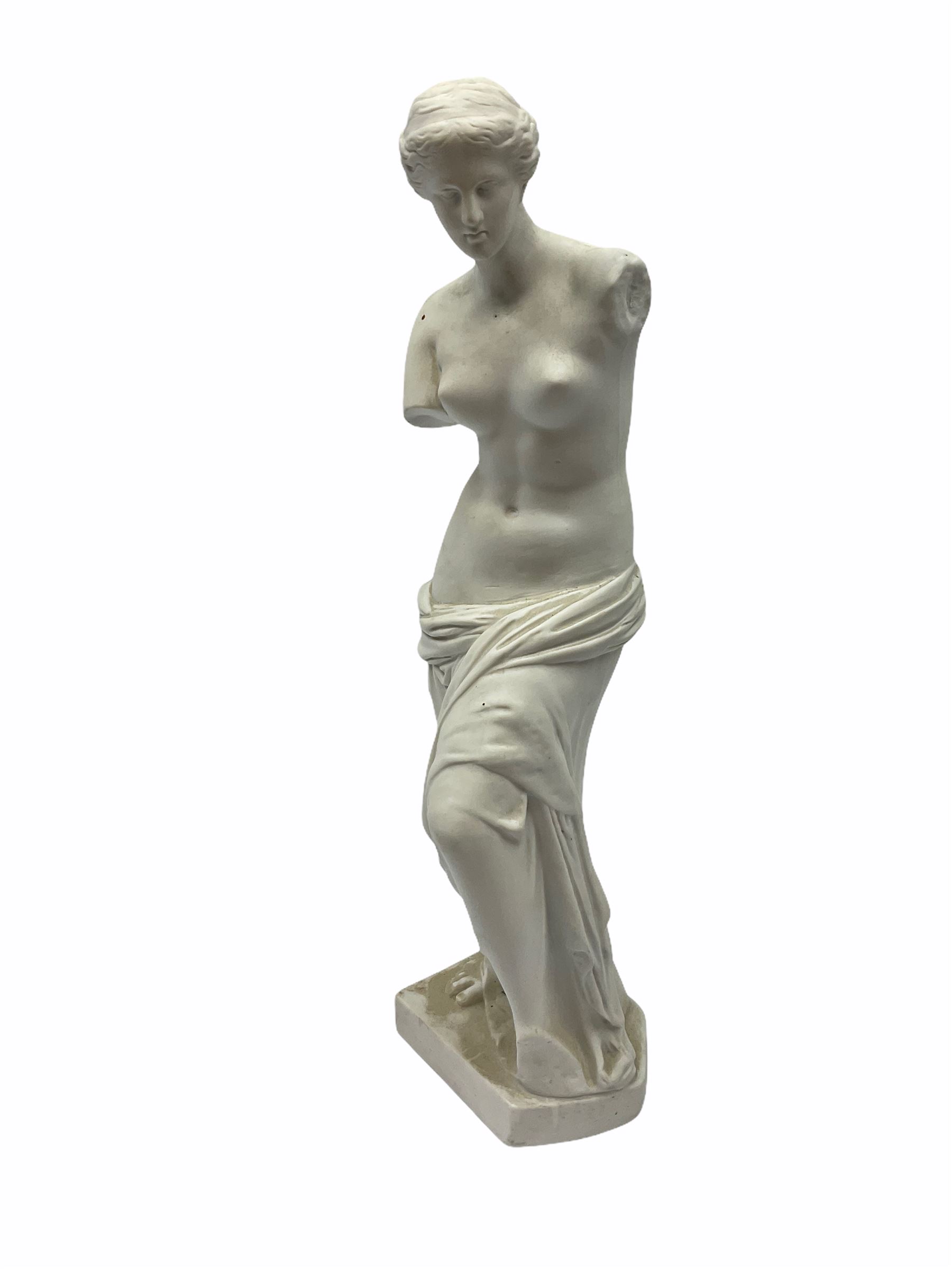 Victorian Parian ware twin handled vase detailed with Bacus masks fruiting vines and floral sprays H36cm, together with a Parian jug H14.5cm, classical Parian sculpture H40cm, decorative plaque decorated in high relief depicting two children D18.5cm. 