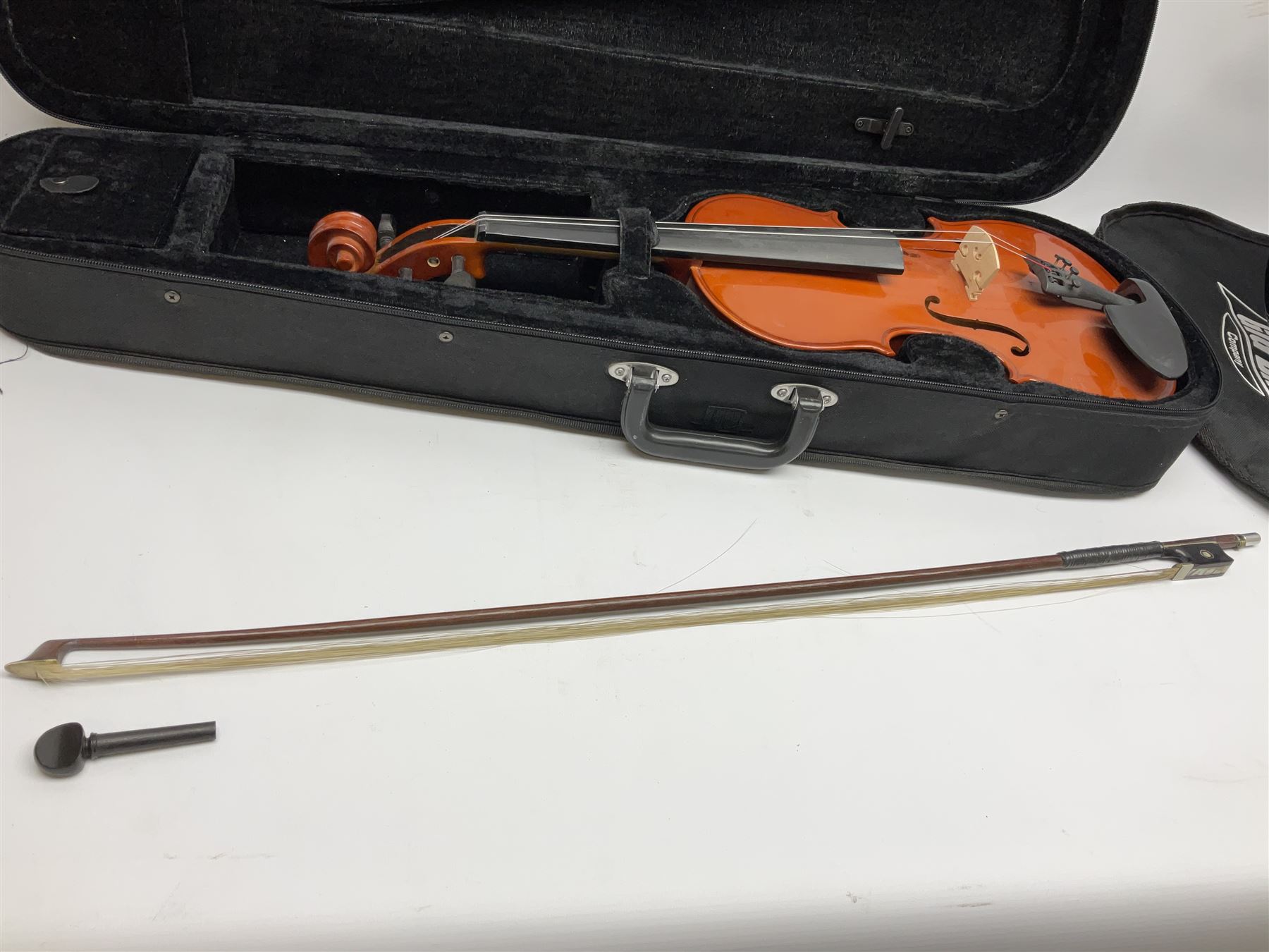 Dean small or child's size electric guitar in black, serial no.O09121956 L85cm; in gig bag; and modern student's violin with 35.5cm two-piece back in fitted carrying case with older bow (2)