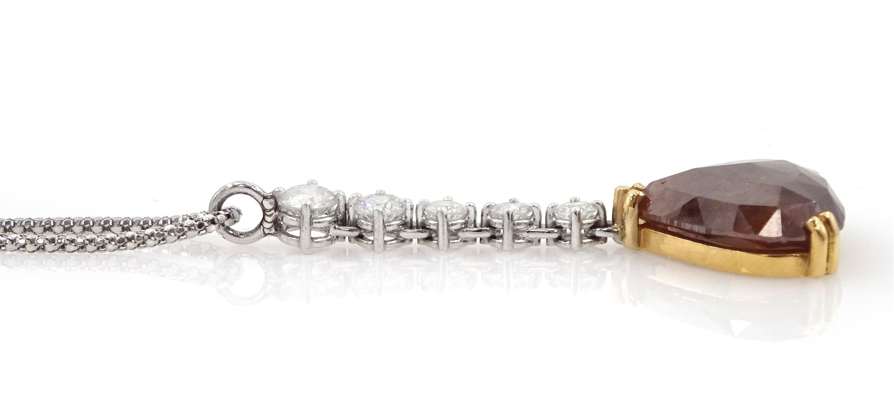 18ct white and yellow gold diamond pendant necklace, single pear cut fancy red/brown diamond of approx 5.70 carat, suspending from a graduating five stone round brilliant cut white diamond bail, on a fancy bead link chain necklace, total white diamond weight approx 0.75 carat