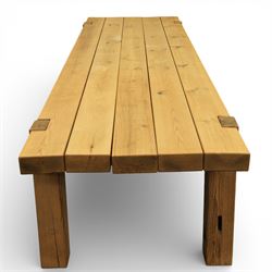 Modern large oak plank top dining table and twelve brown leather high back chairs, table of rustic construction five solid planks with exposed supports, the chairs in brown leather hide with ten standard height and a pair of taller chairs for the foot and head of the table