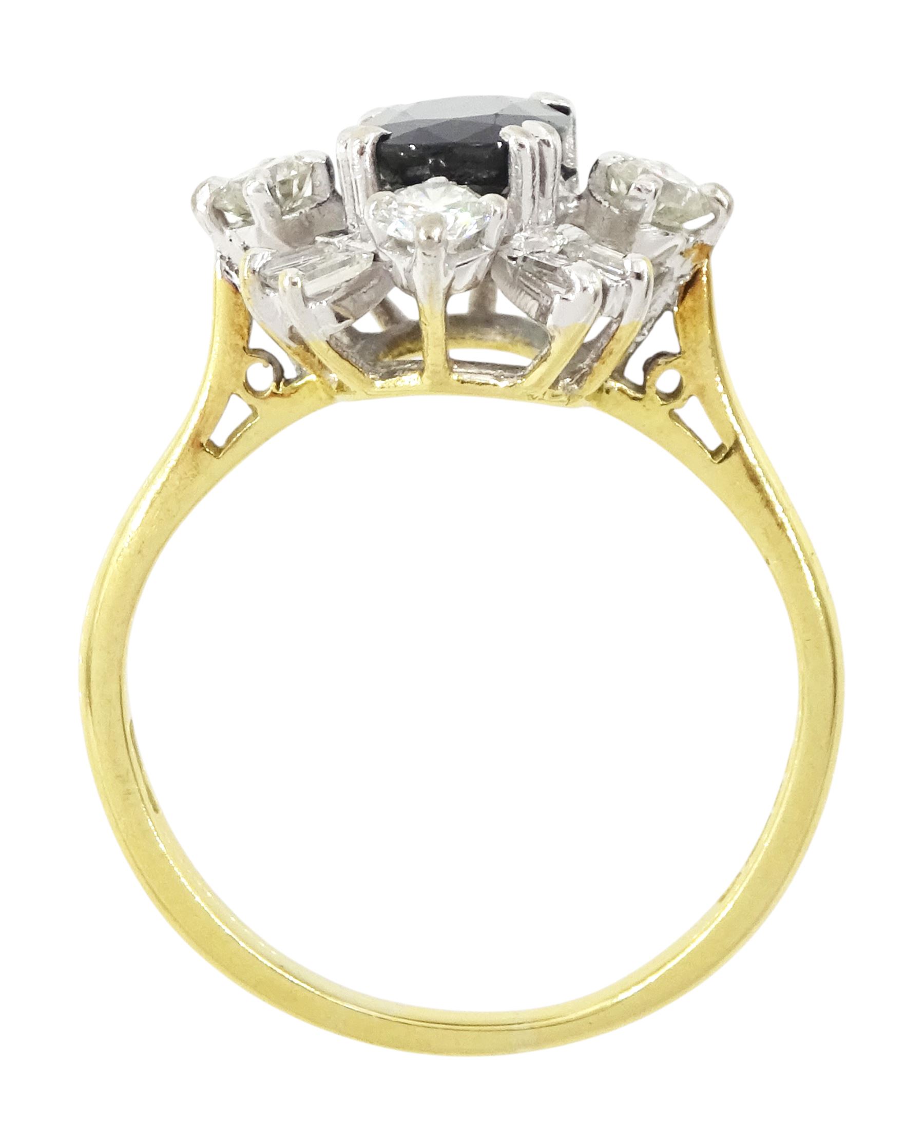 18ct gold sapphire and diamond cluster ring, single oval cut sapphire of approx 1.65 carat, surrounded by four round brilliant cut diamonds and eight baguette cut diamonds, London 1975, total diamond weight approx 0.60 carat
